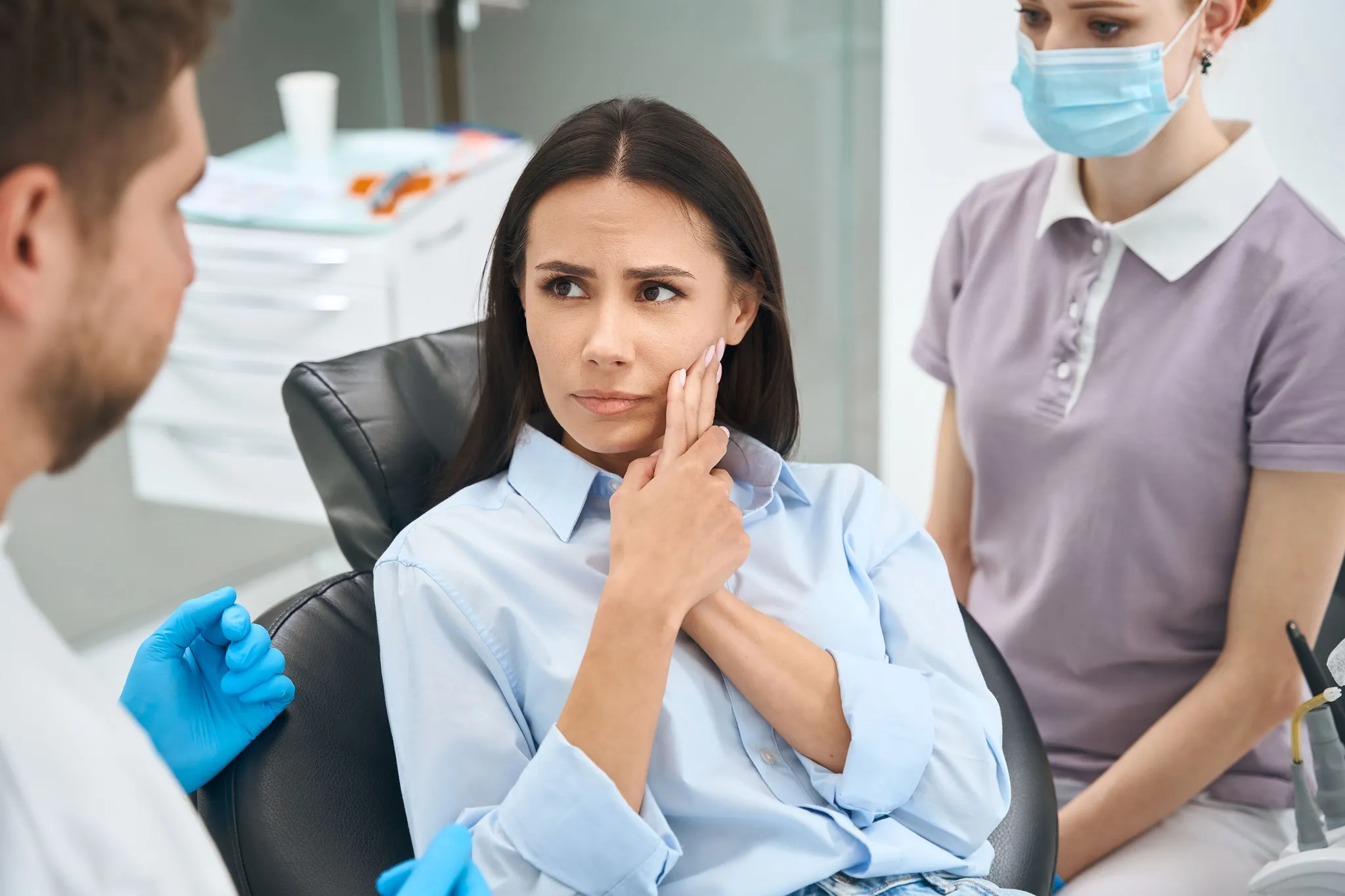 anxious client complaining to stomatologist on sha
