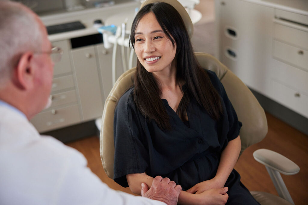 A dental patient consulting with their doctor
